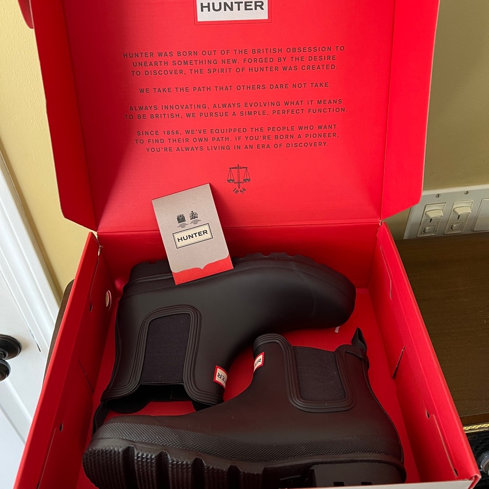 Men’s Hunter brand, chelsea rain boots.  Brand new in box.  USA men’s 10. Black.